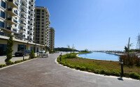 Квартира 1+1 площадью 45 м² с садом 35 м² в районе Махмутлар-id-11019-фото-11