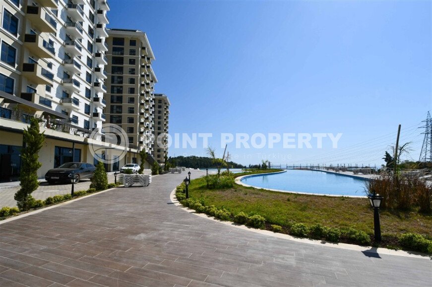 Квартира 1+1 площадью 45 м² с садом 35 м² в районе Махмутлар-id-11019-фото-11