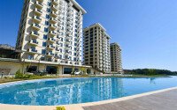 Квартира 1+1 площадью 45 м² с садом 35 м² в районе Махмутлар-id-11019-фото-12