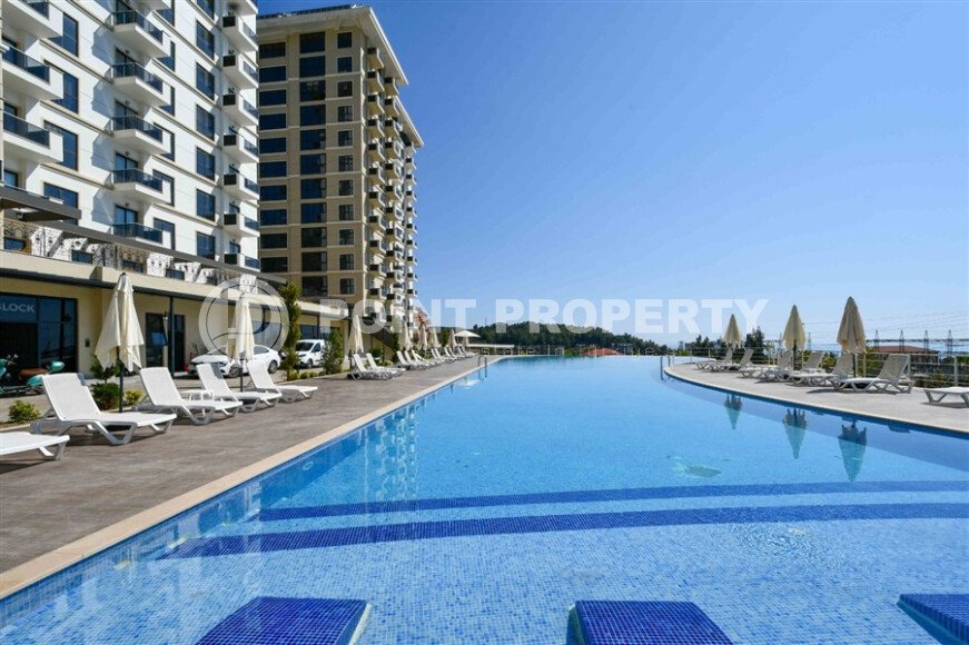 Квартира 1+1 площадью 45 м² с садом 35 м² в районе Махмутлар-id-11019-фото-15