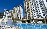 Квартира 1+1 площадью 45 м² с садом 35 м² в районе Махмутлар-id-11019-фото-16