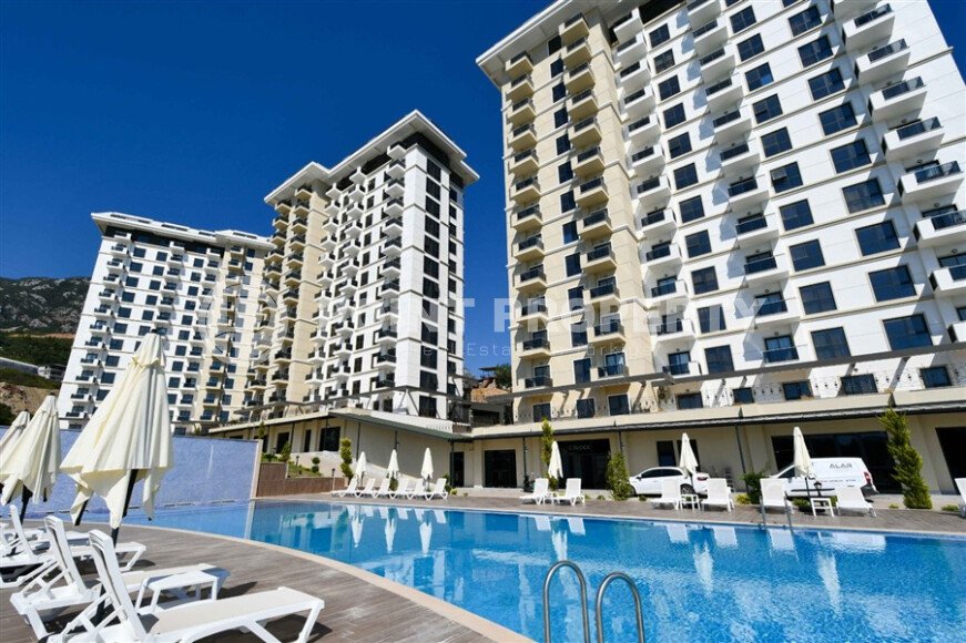 Квартира 1+1 площадью 45 м² с садом 35 м² в районе Махмутлар-id-11019-фото-16