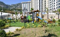 Квартира 1+1 площадью 45 м² с садом 35 м² в районе Махмутлар-id-11019-фото-17
