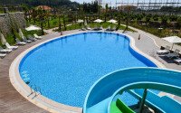 Квартира 1+1 площадью 45 м² с садом 35 м² в районе Махмутлар-id-11019-фото-1