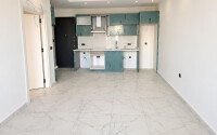 Квартира 1+1, 45 м² в районе Махмутлар-id-11020-фото-2
