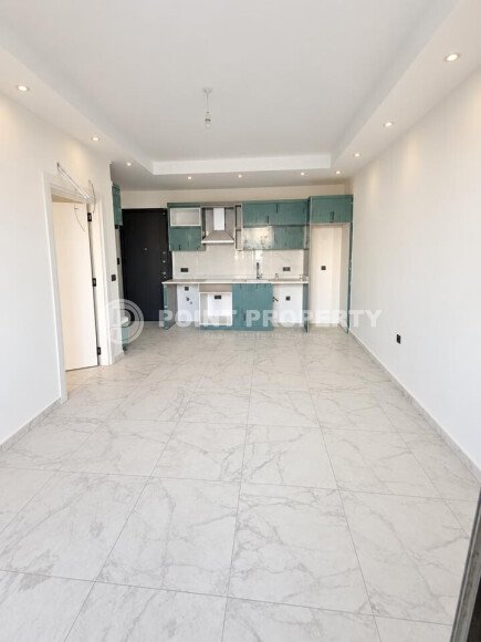 Квартира 1+1, 45 м² в районе Махмутлар-id-11020-фото-2