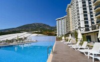 Квартира 1+1, 45 м² в районе Махмутлар-id-11020-фото-11