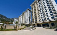 Квартира 1+1, 45 м² в районе Махмутлар-id-11020-фото-12