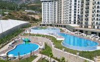 Квартира 1+1, 45 м² в районе Махмутлар-id-11020-фото-17