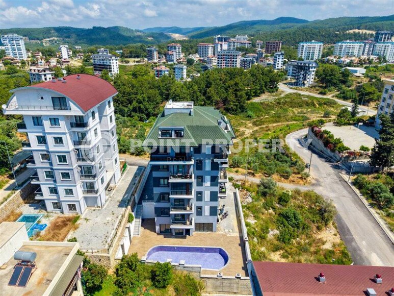 Квартира 1+1 площадью 50 м² в районе Авсаллар-id-11023-фото-11