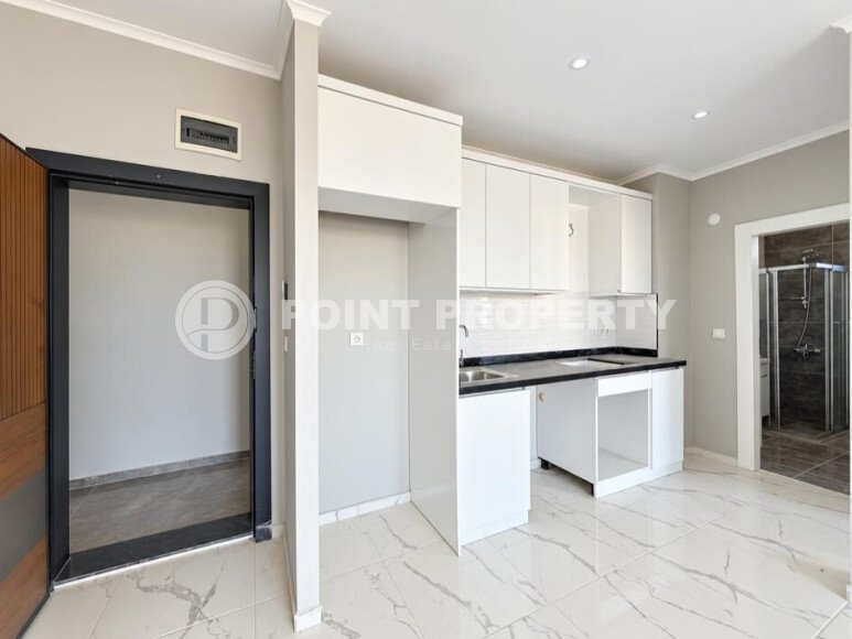 Квартира 1+1 площадью 50 м² в районе Авсаллар-id-11023-фото-2