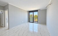 Квартира 1+1 площадью 50 м² в районе Авсаллар-id-11023-фото-4