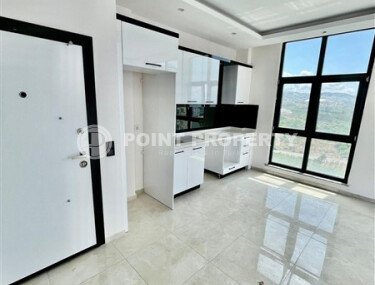 Квартира 1+1 площадью 50 м² в районе Махмутлар-id-11029-фото-5