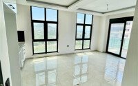 Apartment 1+1 with an area of 50 m² in the Mahmutlar area-id-11029-photo-3