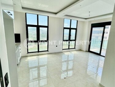 Квартира 1+1 площадью 50 м² в районе Махмутлар-id-11029-фото-3