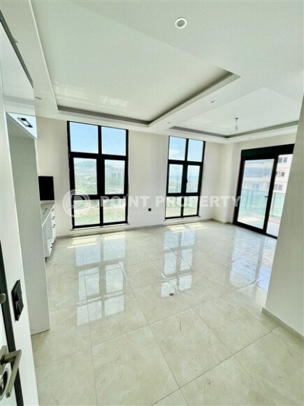 Apartment 1+1 with an area of 50 m² in the Mahmutlar area-id-11029-photo-3