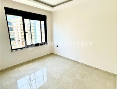 Квартира 1+1 площадью 50 м² в районе Махмутлар-id-11029-фото-4