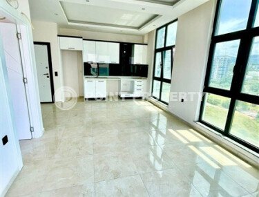 Квартира 1+1 площадью 50 м² в районе Махмутлар-id-11029-фото-2
