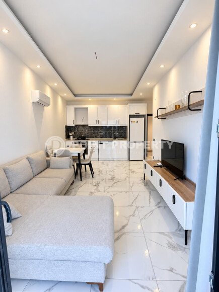 Апартаменты 1+1, 50 м² в районе Махмутлар, 350 м до моря-id-11030-фото-2