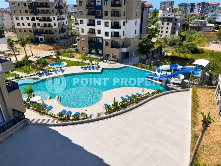 Квартира 1+1 площадью 55 м² в районе Авсаллар, 950 м до моря-id-11032-фото-12