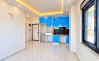 Квартира 1+1 площадью 55 м² в районе Авсаллар, 950 м до моря-id-11032-фото-4