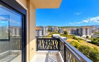 Квартира 1+1 площадью 55 м² в районе Авсаллар, 950 м до моря-id-11032-фото-11