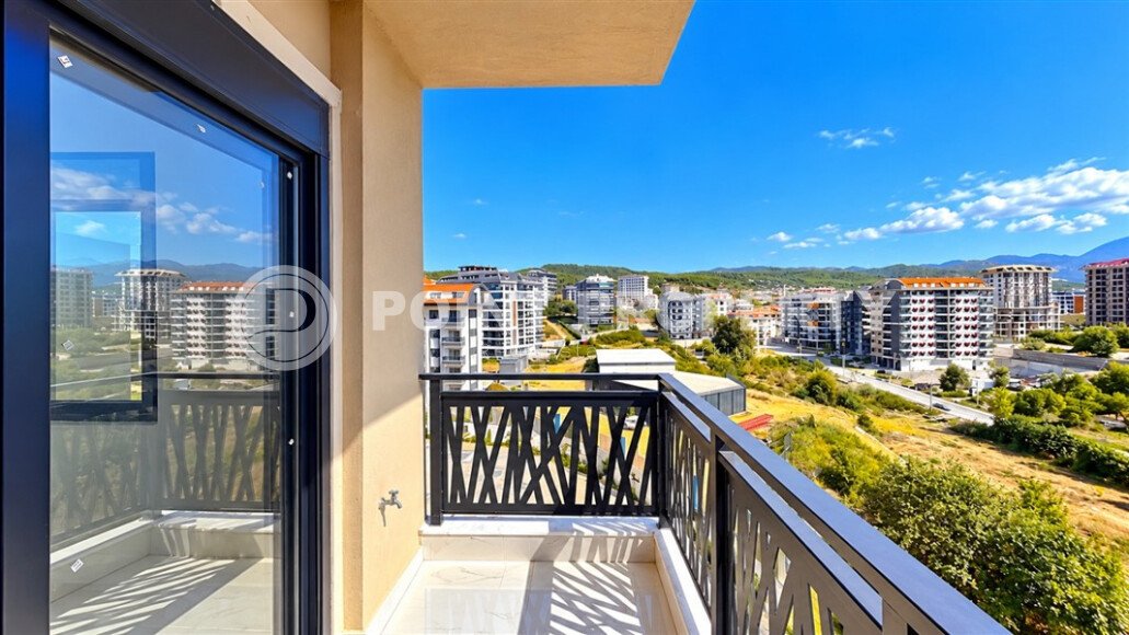 Квартира 1+1 площадью 55 м² в районе Авсаллар, 950 м до моря-id-11032-фото-11