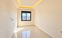 Квартира 1+1 площадью 55 м² в районе Авсаллар, 950 м до моря-id-11032-фото-5