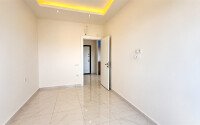 Квартира 1+1 площадью 55 м² в районе Авсаллар, 950 м до моря-id-11032-фото-6