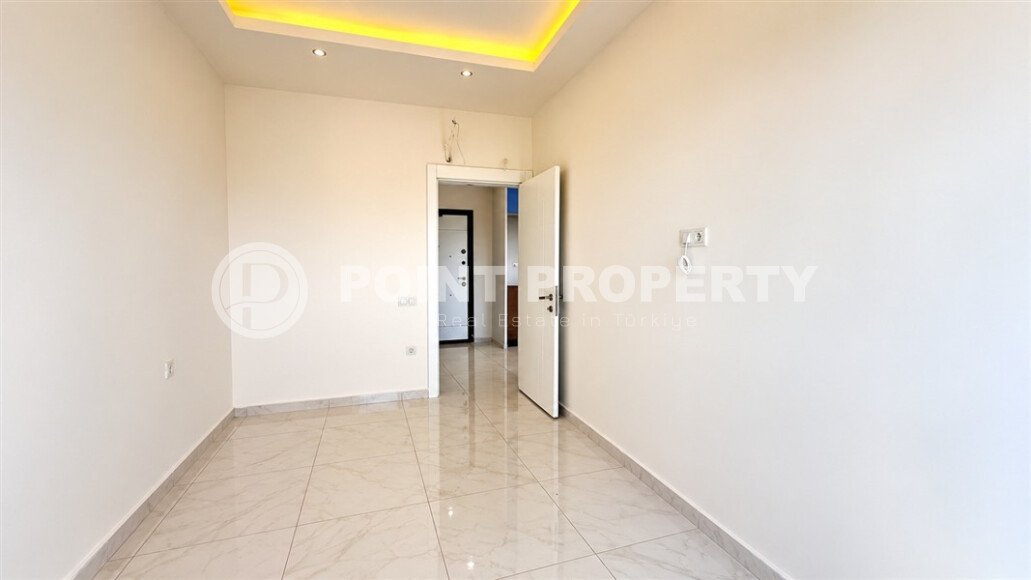 Квартира 1+1 площадью 55 м² в районе Авсаллар, 950 м до моря-id-11032-фото-6