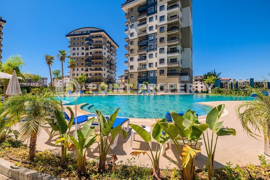 Квартира 1+1 площадью 55 м² в районе Авсаллар, 950 м до моря-id-11032-фото-28