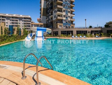 Квартира 1+1 площадью 55 м² в районе Авсаллар, 950 м до моря-id-11032-фото-1