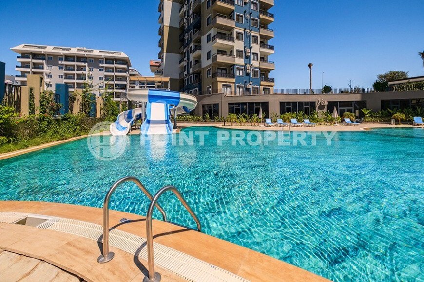 Квартира 1+1 площадью 55 м² в районе Авсаллар, 950 м до моря-id-11032-фото-1