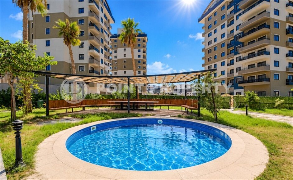 Квартира 1+1 площадью 55 м² в районе Авсаллар, 950 м до моря-id-11032-фото-32