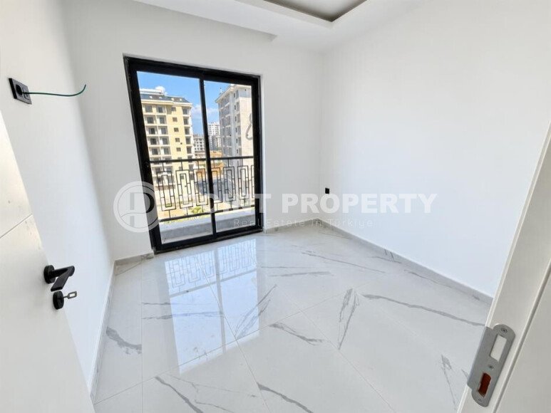 Apartment 1+1 with an area of 47 m² in the Mahmutlar area - 650 m from the sea-id-11036-photo-3