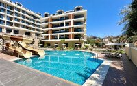 Апартаменты 2+1 площадью 109 м² в районе Хасбахче в Алании-id-11041-фото-24
