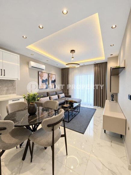 Квартира 1+1 площадью 60 м² в районе Тосмур, Алания — 700 м до моря-id-11044-фото-5