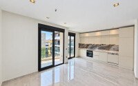 Дуплекс 2+1 площадью 95 м² в микрорайоне Гюллерпынары, в центре Алании — 200 м до моря-id-11047-фото-2