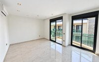 Дуплекс 2+1 площадью 95 м² в микрорайоне Гюллерпынары, в центре Алании — 200 м до моря-id-11047-фото-3