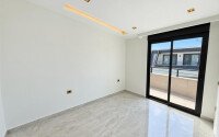 Дуплекс 2+1 площадью 95 м² в микрорайоне Гюллерпынары, в центре Алании — 200 м до моря-id-11047-фото-4