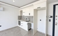 Квартира 1+1 площадью 63 м² в центре Алании, 600 м до моря — можно включить в пакет недвижимости для подачи на гражданство-id-11049-фото-4