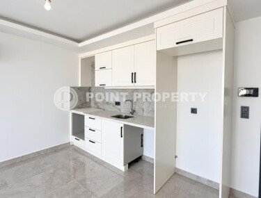 A 1+1 apartment of 63 m² in the center of Alanya, 600 m from the sea - can be included in the real estate package for citizenship applications-id-11049-photo-4
