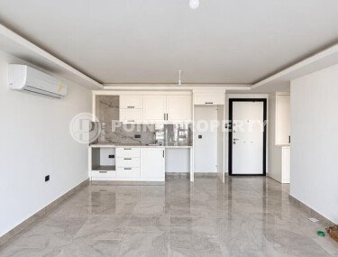 A 1+1 apartment of 63 m² in the center of Alanya, 600 m from the sea - can be included in the real estate package for citizenship applications-id-11049-photo-3