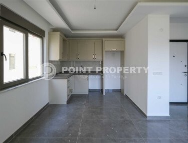 Квартира 1+1 площадью 58 м² в районе Махмутлар — 300 м до моря-id-11068-фото-2