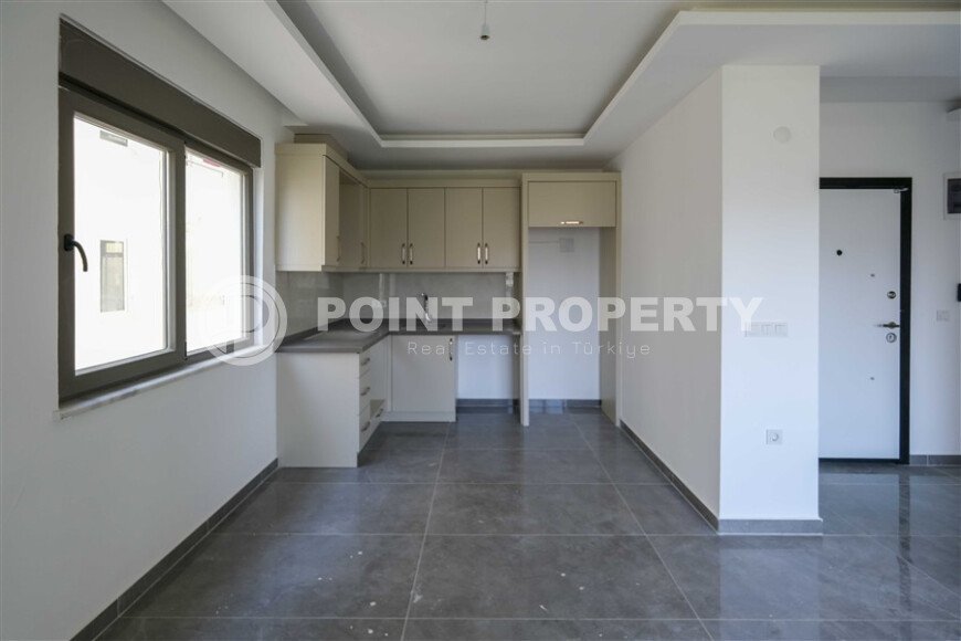 Квартира 1+1 площадью 58 м² в районе Махмутлар — 300 м до моря-id-11068-фото-2