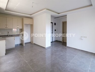 Квартира 1+1 площадью 58 м² в районе Махмутлар — 300 м до моря-id-11068-фото-3