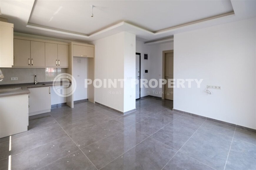 Квартира 1+1 площадью 58 м² в районе Махмутлар — 300 м до моря-id-11068-фото-3