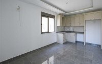 Квартира 1+1 площадью 58 м² в районе Махмутлар — 300 м до моря-id-11068-фото-4