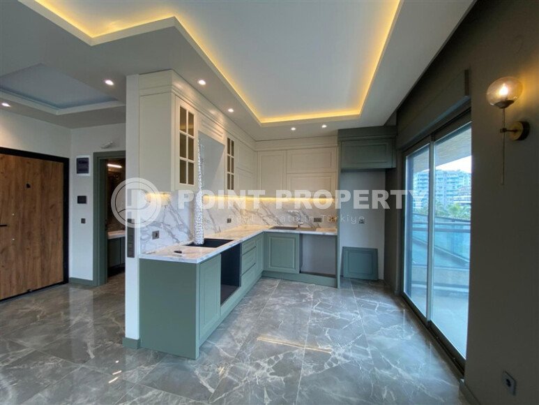 Apartments with layouts 1+1, 2+1, in a residential complex under construction, in the area of Alanya - lower Oba-id-5491-photo-7