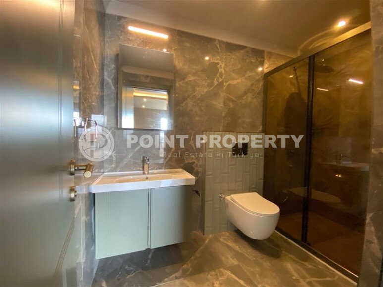 Apartments with layouts 1+1, 2+1, in a residential complex under construction, in the area of Alanya - lower Oba-id-5491-photo-10